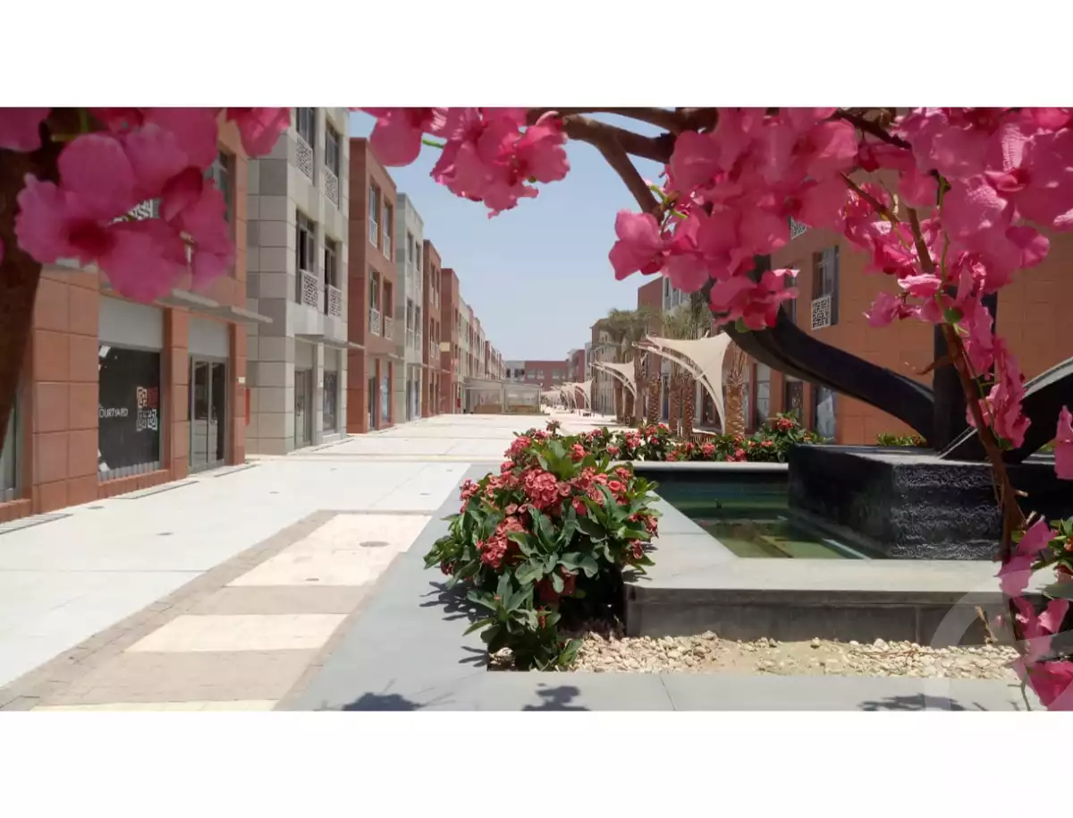 https://aqarmap.com.eg/ar/listing/5985868-for-sale-cairo-el-sheikh-zayed-city-compounds-the-courtyard-mall-dorra