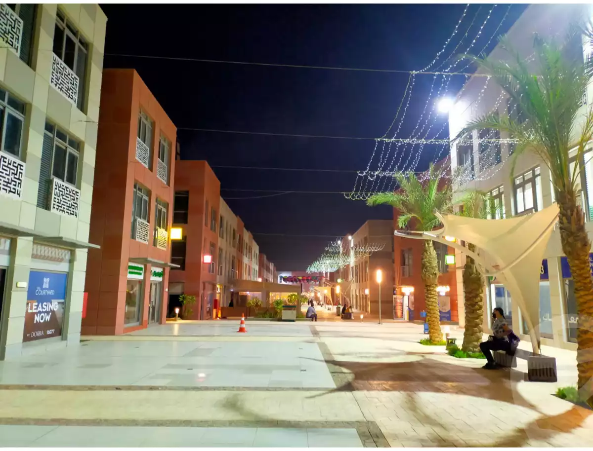 https://aqarmap.com.eg/ar/listing/6158031-for-sale-cairo-el-sheikh-zayed-city-compounds-the-courtyard-mall-dorra
