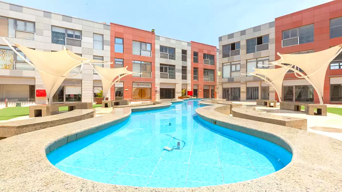 https://aqarmap.com.eg/ar/listing/6744834-for-rent-cairo-el-sheikh-zayed-city-compounds-the-courtyard-mall-dorra