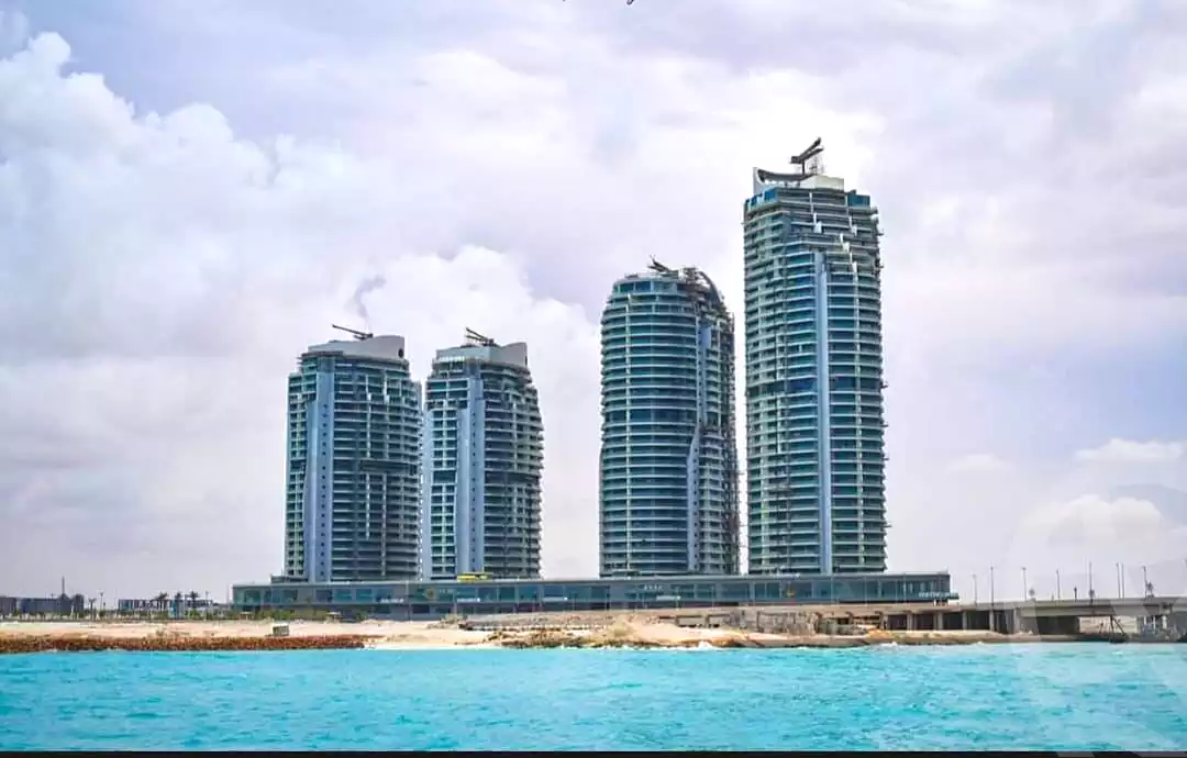 https://aqarmap.com.eg/ar/listing/7114919-for-sale-north-coast-new-alamein-mntj-t-l-lmyn-ljdyd-beachfront-tower-city-edge