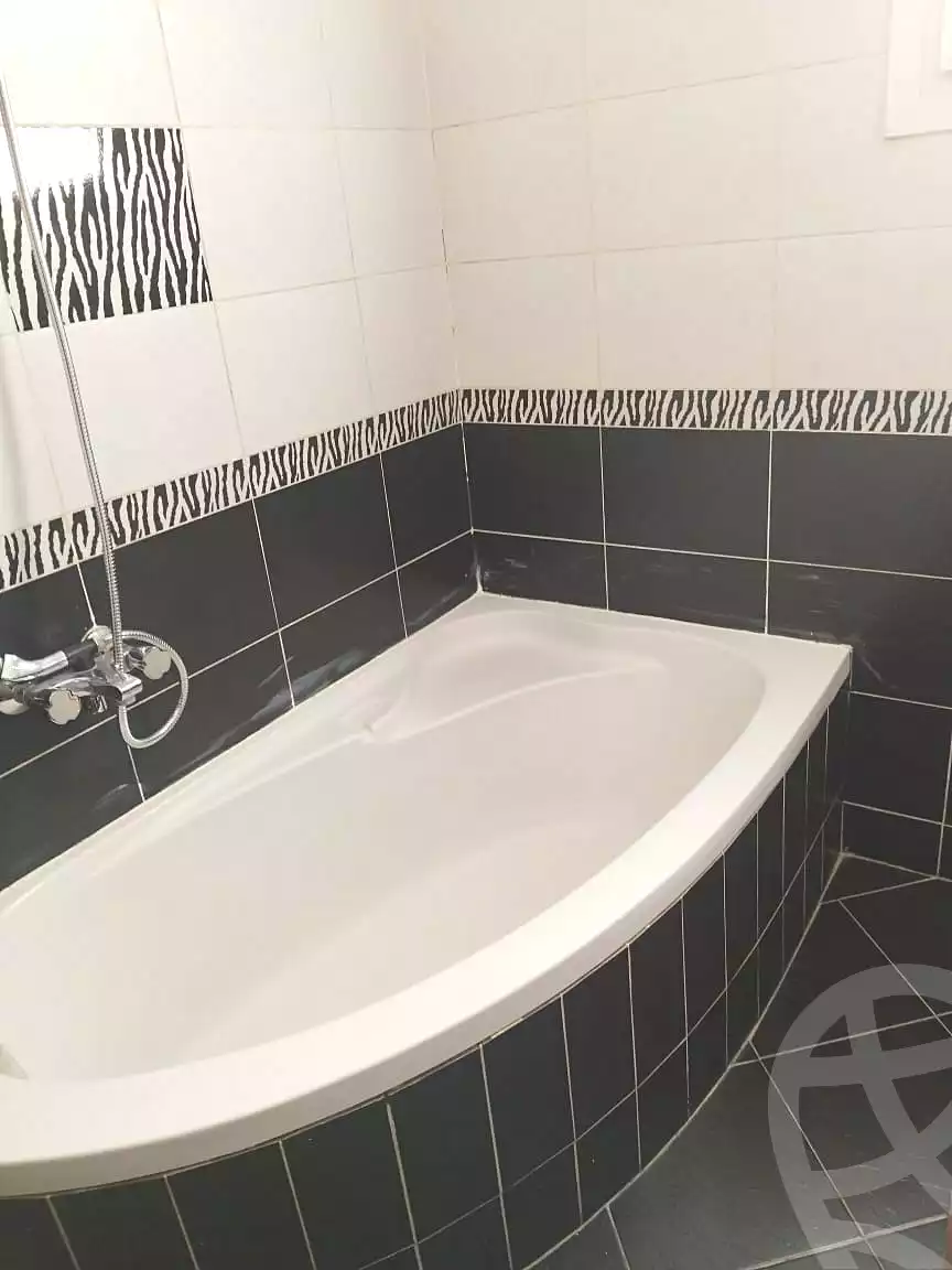 https://aqarmap.com.eg/ar/listing/7251684-for-rent-cairo-6th-of-october-el-hay-el-motamyz-fourth-touristic-village-mohamed-ahmed-barhoma-st