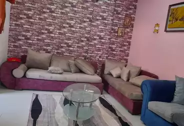 For rent in Al-Rehab, a 90 sqm furnished apartment, ground floor, with garden