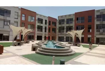 https://aqarmap.com.eg/ar/listing/4973477-for-sale-cairo-el-sheikh-zayed-city-compounds-the-courtyard-mall-dorra