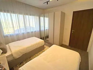 Apartment with Garden For sale in Mar Ville Compound - AlMarasem, Expansion Of El Sheikh Zayed City, 136 sqm